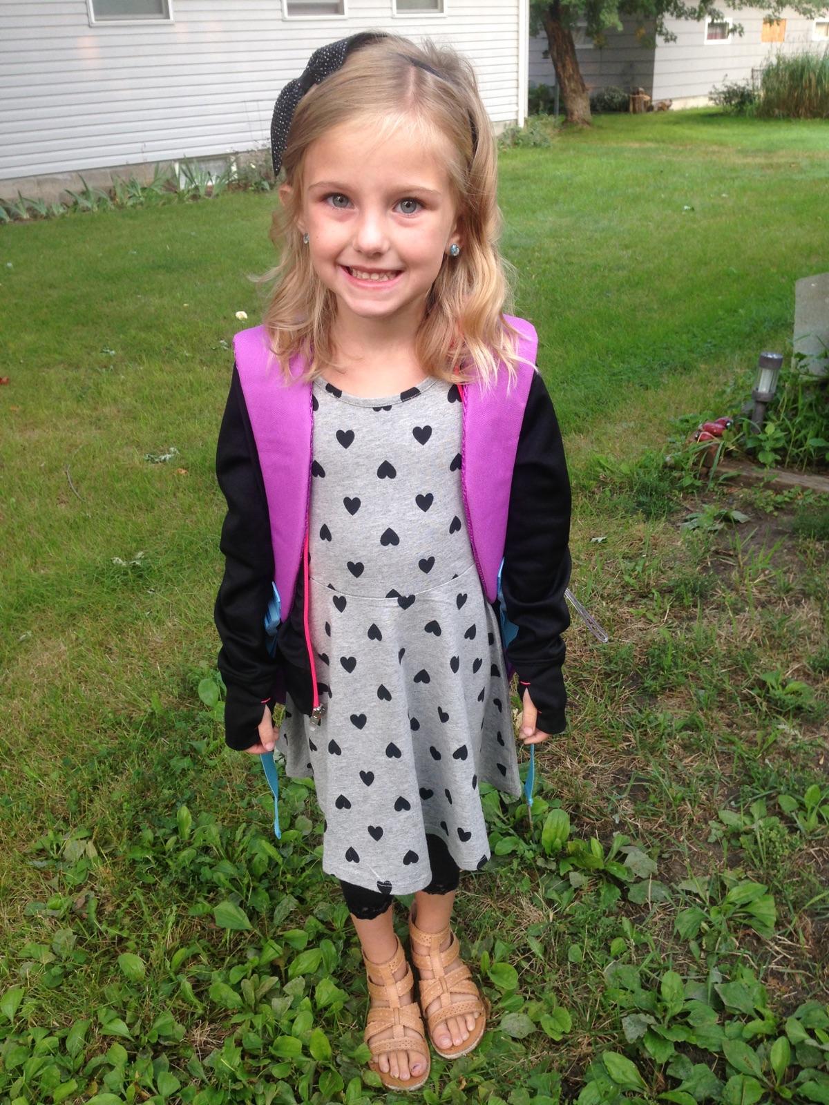 The Meier's mom, dad, 3 kids & a dog First day of School!