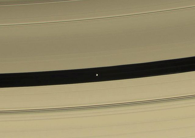Cassini spacecraft reveals Saturn’s 'Flying Saucer' Moon Pan  Saturn%2Bring%2Bmoon%2Balien%2Bcraft%2BPan