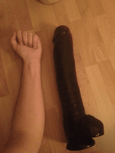 Big dildo to a fist