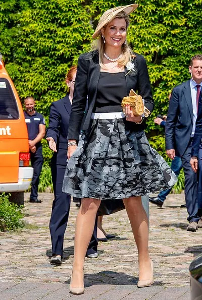 Queen Maxima wore Matthijs van Bergen Coppens Lelies jacket and floral print skirt