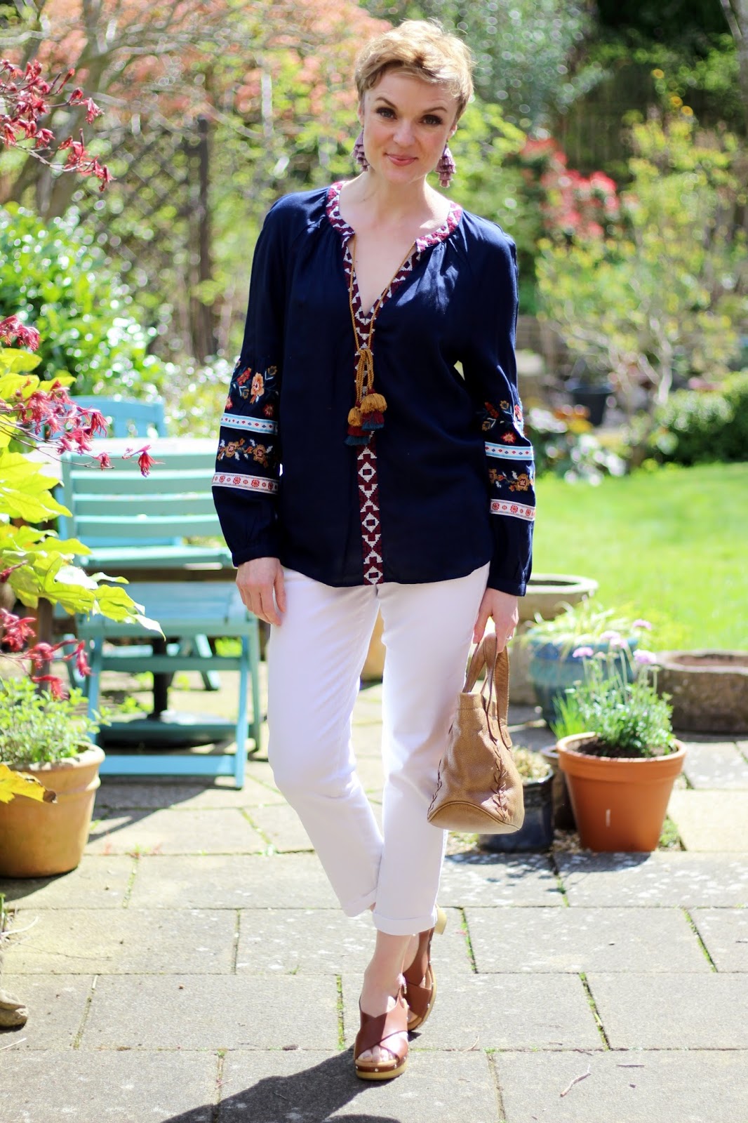 Navy Embroidered Boho Blouse, White jeans, Tan Clog Sandals | Fake Fabulous
