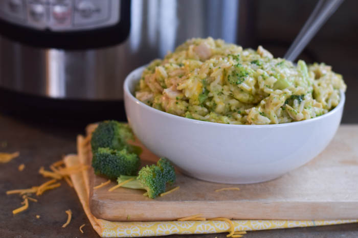 This Instant Pot Cheesy Chicken Broccoli Rice is an easy one pot casserole to feed the whole family. 