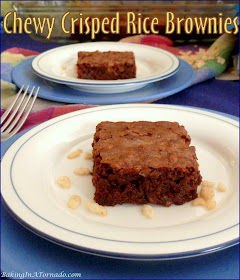 Chewy Crisped Rice Brownies are a dense chocolatey treat with crisped rice for a chewy and crispy texture. | Recipe developed by www.BakingInATornado.com | #recipe #chocolate