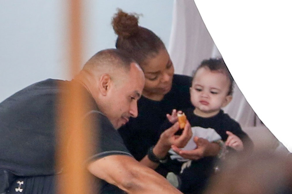 Jackson pictured feeding her baby son Eissa in Miami Beach, Florida