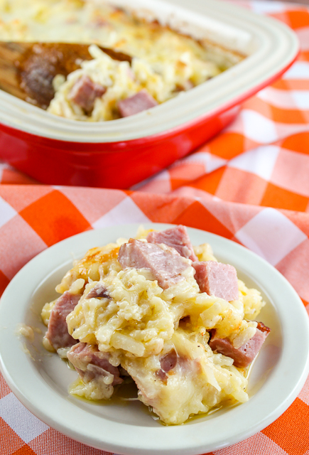 Cheesy Potatoes and Ham are so easy and delicious! You'll love the flavor from the Jarlsberg cheese and the creaminess from the sauce! Leftover ham never tasted so good!