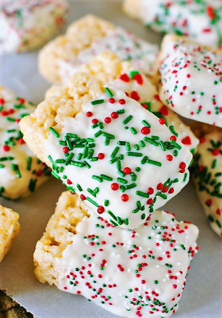 Chocolate Dipped Treats - Christmas White Chocolate-Dipped Rice Krispie Treats Image ~ A super easy, super cute, & super tasty Christmas treat.  They're perfect for a fun little gift or for a classroom Christmas party treat!