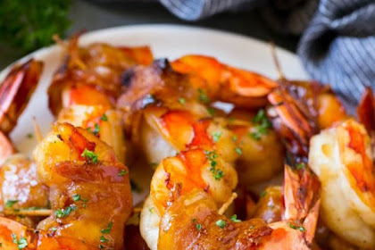 SWEET AND SAVORY BACON WRAPPED SHRIMP