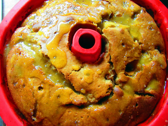 Caramel pear bundt cake by Laka kuharica: poke holes in the cake, pour the brown butter glaze over it.