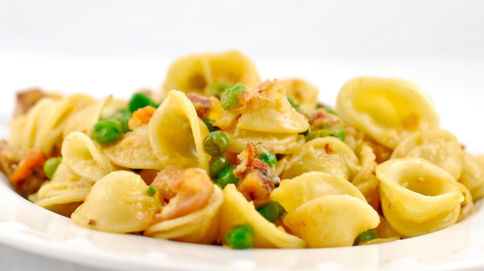 A simple recipe blog Orecchiette Pasta with Pancetta, Peas and Pecorino