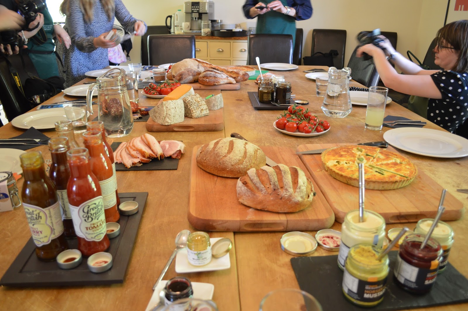 bread, sauces, cheeses, quiche, ham, buffet