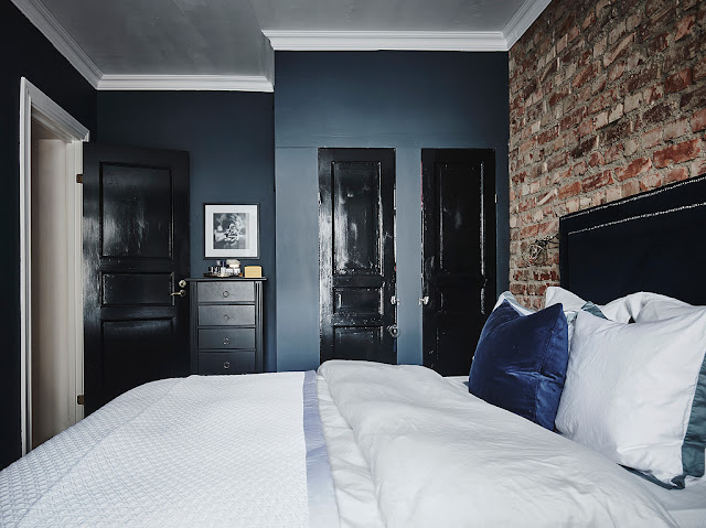 Un precioso dormitorio con pared de ladrillo visto | Etxekodeco