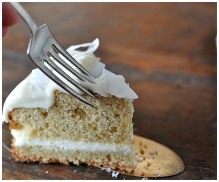 rich coconut-cake with cream cheese topping and white chocolate, gluten free