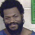 Homeless Man Accused Of Dropping TV On Woman From Third-floor Balcony Grins For His Mugshot