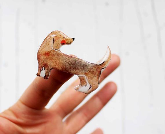 Dinabijushop's polymer clay and resin pin dog