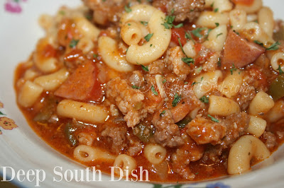 An American goulash, made with ground beef, Italian sausage and andouille, tomato, garlic and pasta, and seasoned with the Trinity and a bit of Cajun seasoning.