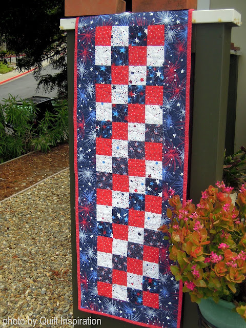 "Parade of Stars Table Runner" is a Free Patriotic Quilted Table Top Pattern designed by Marina & Daryl Lynn from Quilt Inspiration!