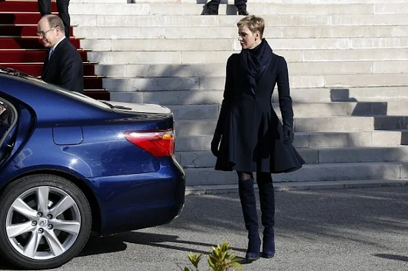 Prince Albert II of Monaco  and Princess Charlene leave the Monaco Cathedral after the Sainte Devote festivities in Monaco