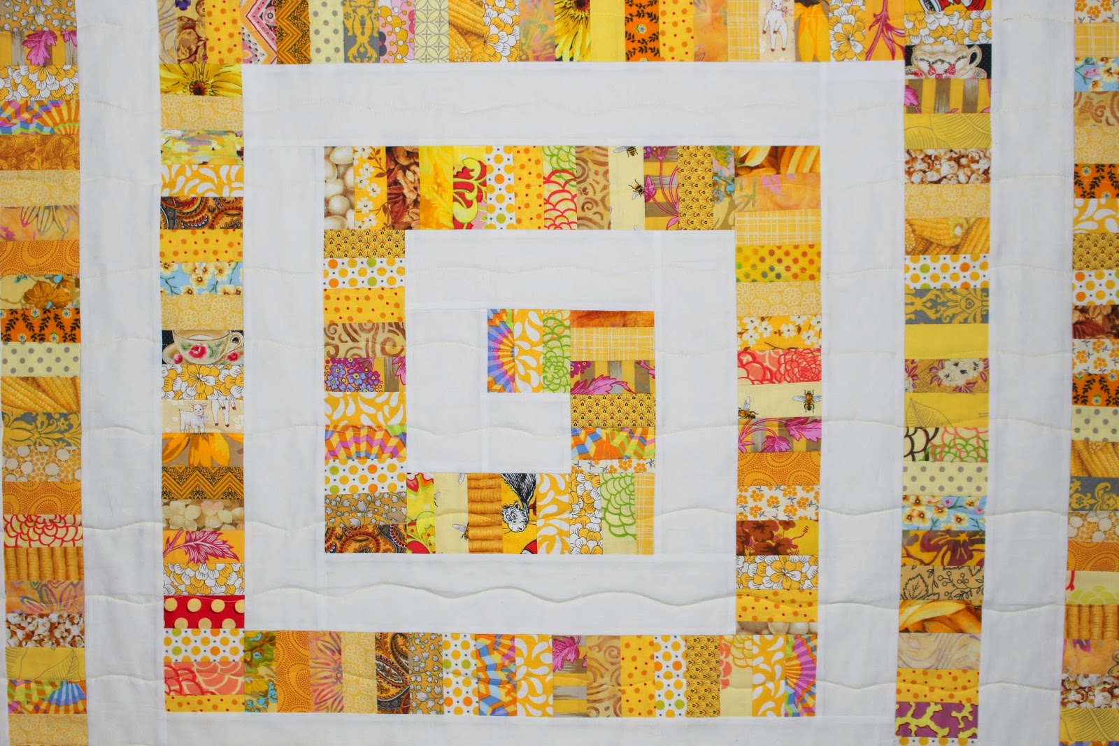 Selvage Blog Yellow Brick Road Spiral Quilt is Finished!