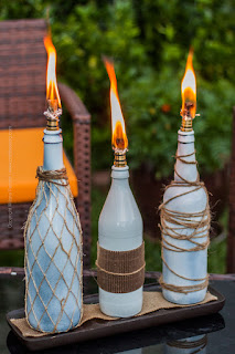 http://craftbeering.com/beer-bottle-tiki-torches/