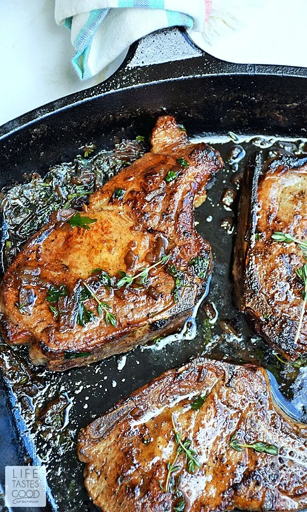 Pan-Seared Pork Chops with an herb butter sauce | by Life Tastes Good is a quick and easy dinner you can have on the table in less than 30 minutes! These pork chops melt in your mouth!