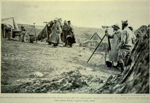 WATCHING THE DISTANT FIGHTING THROUGH THE BINOCULARS ON AN ARTILLERY OBSERVATION POST ON CHUKE MOUNTAIN WHILE THE SERBS WERE TAKING HILL 1212