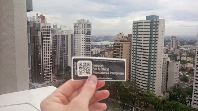 Fair and ethical translators and interpreters sticker tagging campaign for elingual.net and spreadthewordwear.com Curitiba, Parana, Brazil supports fair and ethical translators and interpreters