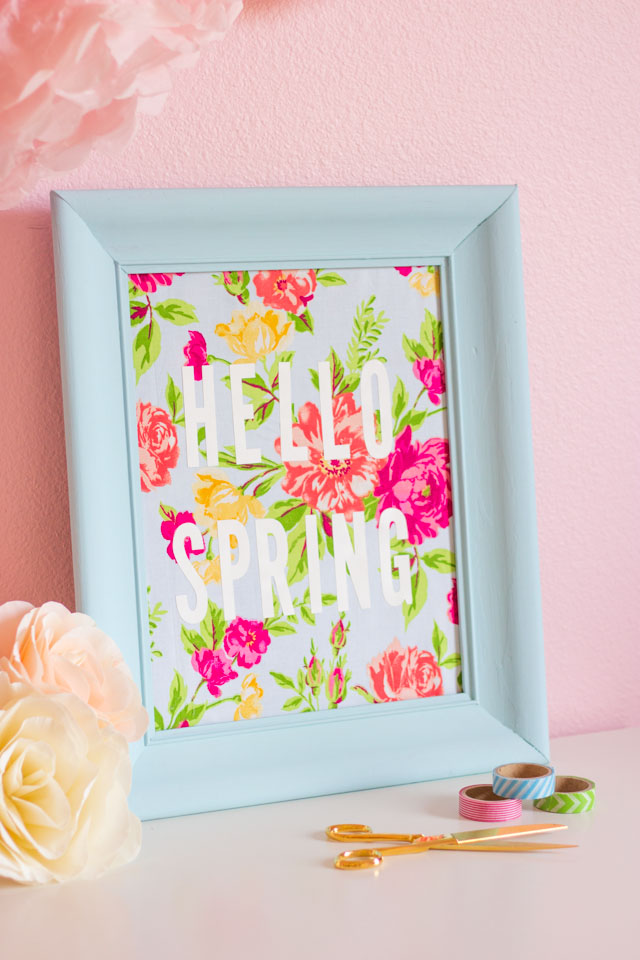 Such a fun thrift store makeover! Transform an old picture frame into this colorful Hello Spring fabric art! Such a fun thrift store makeover! Transform an old picture frame into this colorful Hello Spring fabric art!