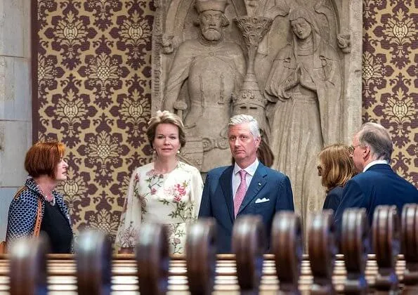 Queen Mathilde wore Giambattista Valli floral print silk chiffon midi dress in Neutrals. Princess Caroline wore same dress