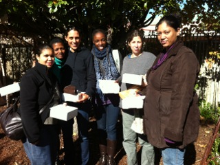 Green Home team members smiling at the camera