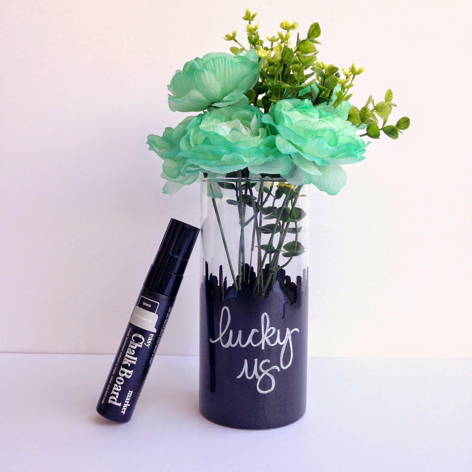 SRM Stickers Blog - Chalkboard "Lucky Us" Vase by Tessa - #chalkboard #chalkmarkers #easy #blackboard #homedecor #stpatricksday #DIY