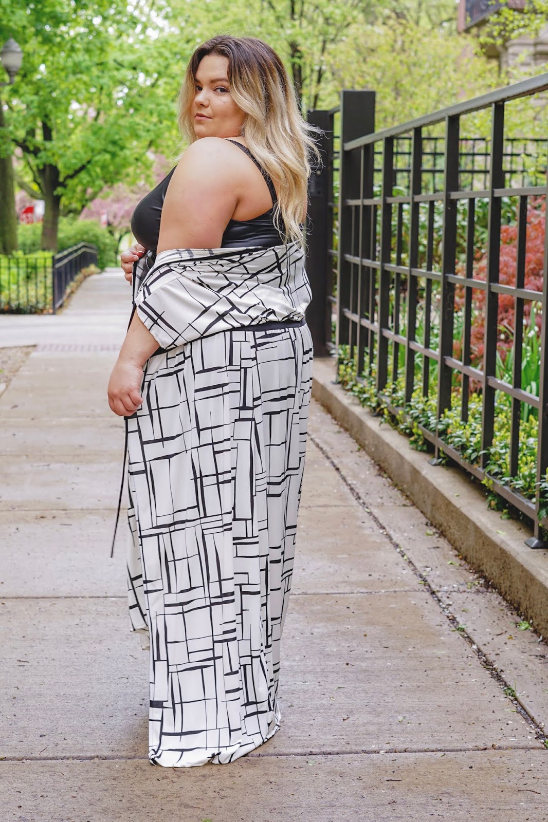 natalie Craig, natalie in the city, plus size fashion, Chicago fashion, plus size fashion blogger, eff your beauty standards, fatshion, skorch magazine, Chicago model, plus size model, plus size petite, affordable plus size clothing, embrace your curves, plus model magazine, petite plus size, fashion nova curve, fashion nova, leather dress, rouched, ruched, slit dress, form fitting dress, affordable pus size dresses