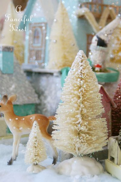 http://afancifultwist.typepad.com/a_fanciful_twist/2013/12/lets-make-vintagey-sparkly-bottle-brush-trees.html