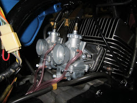 Mikuni carburettors mounted on Manifolds -Yamaha RD125 1974
