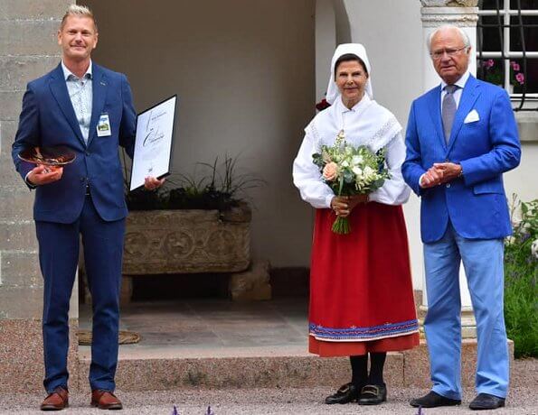 Solliden Palace in Öland. Queen Silvia is wearing a traditional local costume of Oland