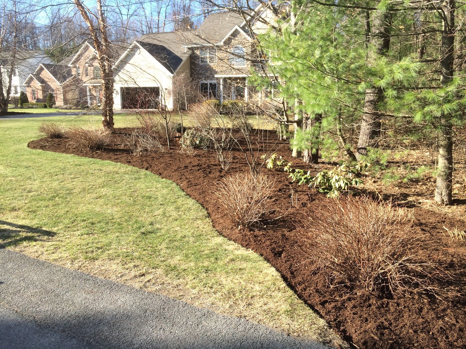 Bryk City Landscaping Mulch Spreading & Edging Capital Region