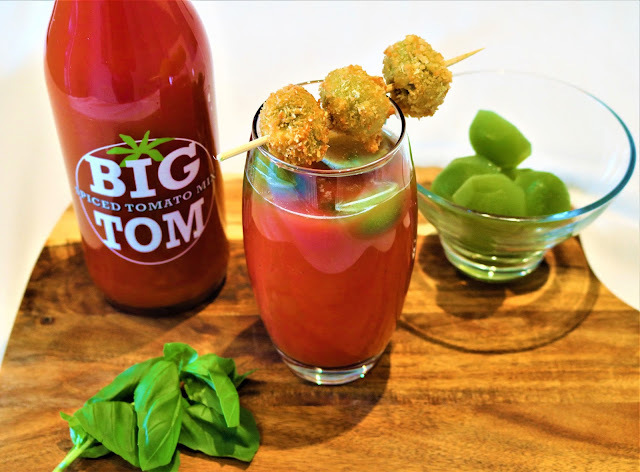Bloody Mary garnished with Blue Cheese Stuffed Olives and  Cucumber & Basil infused ice cubes