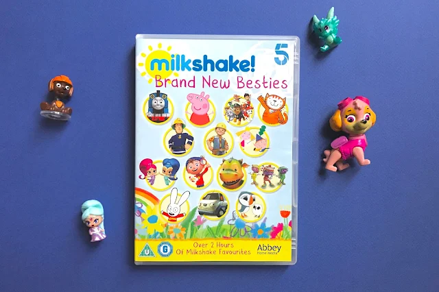Photo of the Milkshake! DVD with a teenie genie from Shimmer and Shine and Tracker and Sky from Paw Patrol