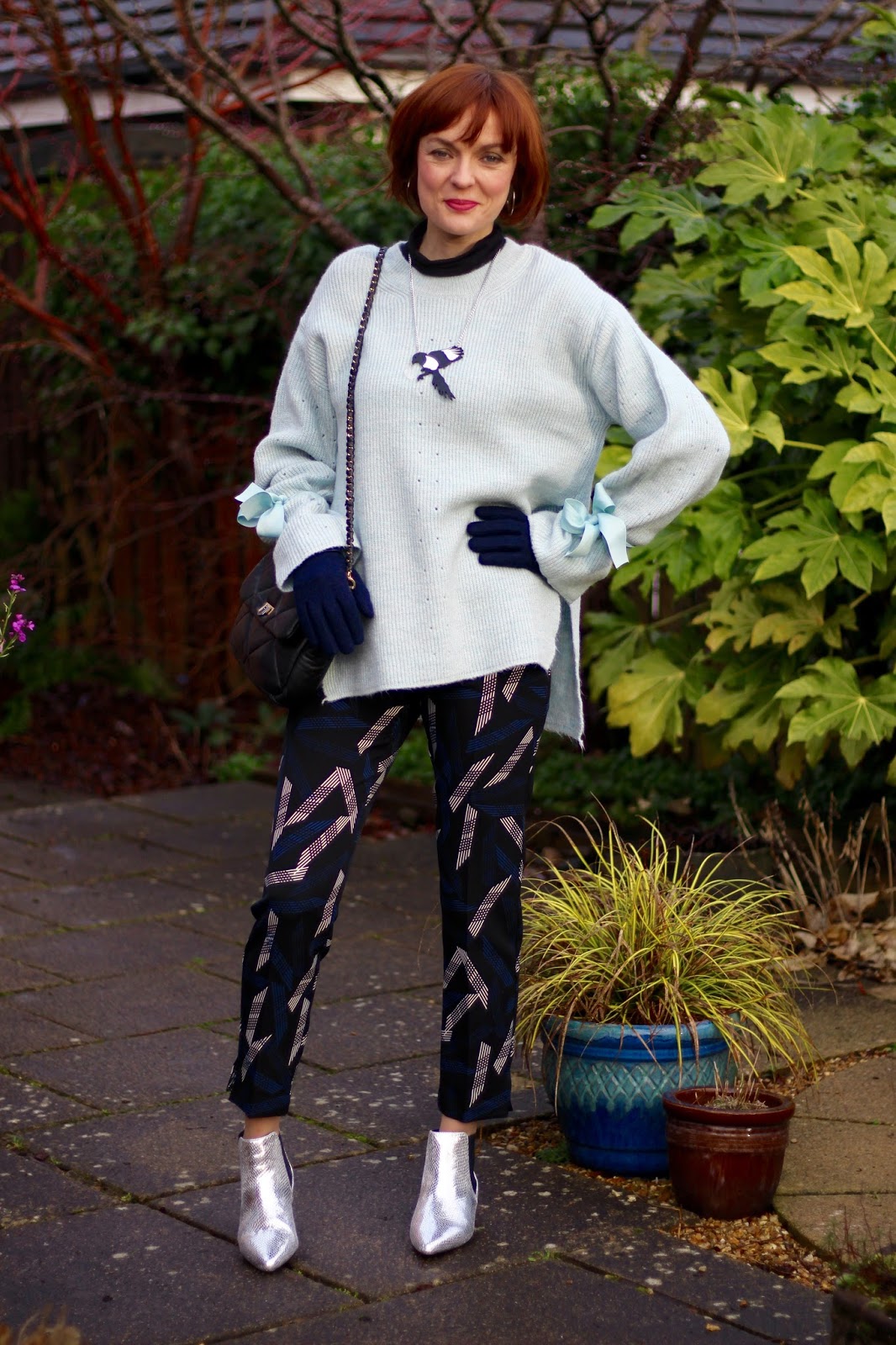 Oversized Topshop Jumper with Statement sleeves, patterned trousers and silver boots | Fake fabulous - style over 40.