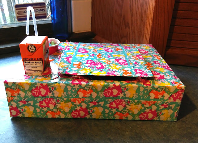 Snack box decorated with duct tape.