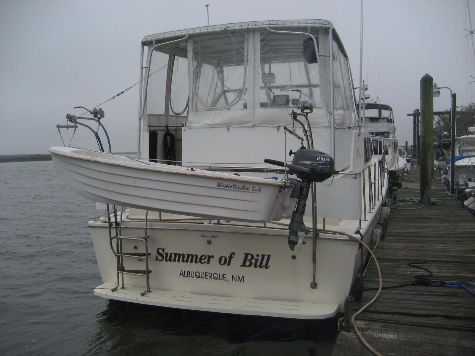 Summer of Bill SOB and Alan Jackson's boat docked next to each other.