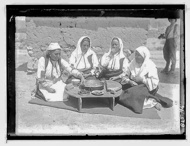 Day of celebration: four women sitting around a coffee table, village Negochani (Niki)