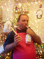 Man holding Dishmop Seductively, with Sparkly Background