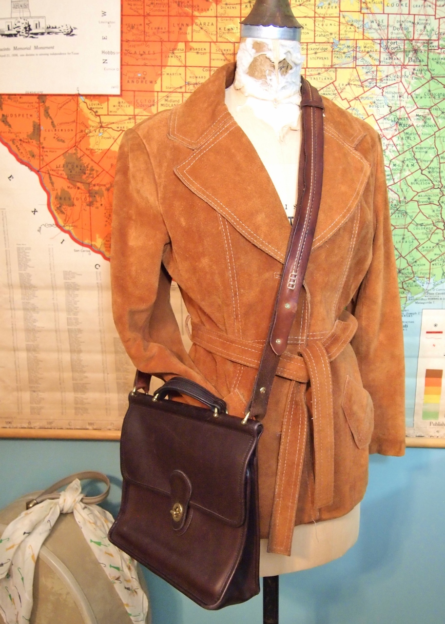 A Place for Margo's Stuff Turn an old leather bag into a backpack