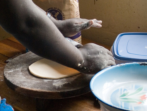Making chapatis in Uganda.
