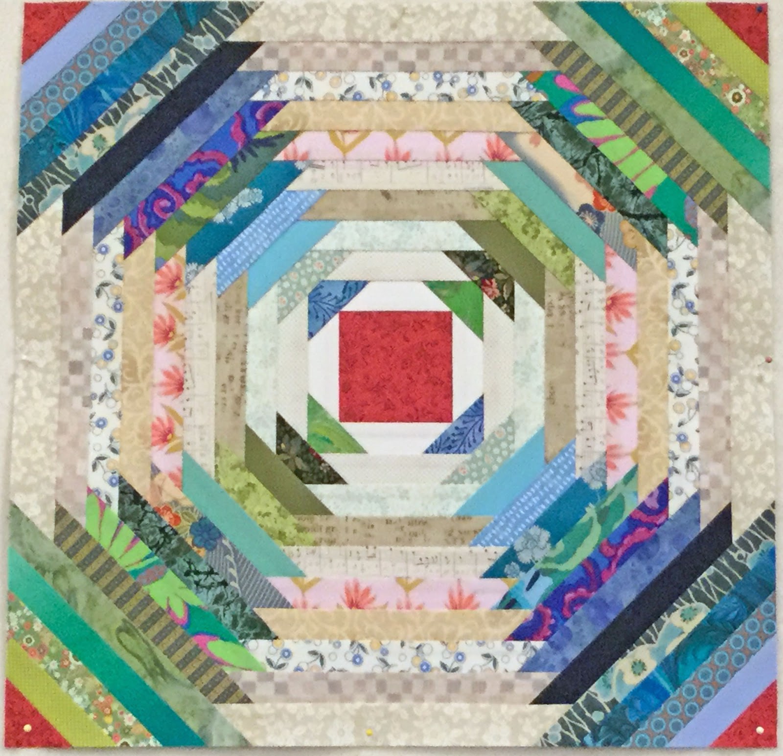 Rebecca Grace Quilting Back to the Pineapple Log Cabin for Now, with