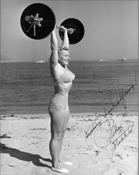 Flashback Summer: 6 Ways to Take a Heart Break - 1940s female weight lifter