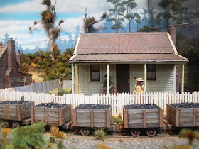 Model of Tangarakau township circa 1930, with a coal train in front.