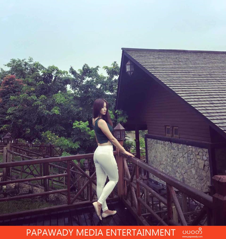 Lu Lu Aung Shows off Her Fashion And Body Curve In White Jeans and Green Outfit 