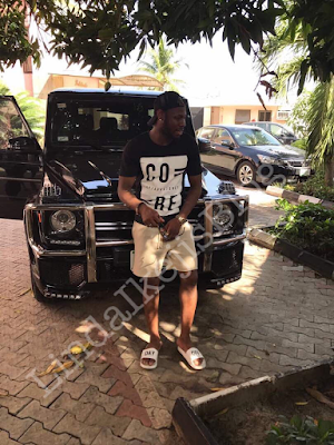 2 Super Eagles star Sylvester Igboun poses with his new $129,000 G-Wagon to celebrate Democracy day (photos)