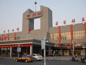 front of Ganzhou Railway Station and a McDonald's